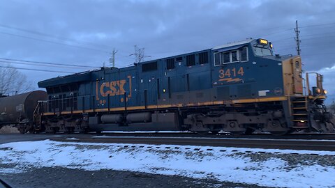 CSX Train engines 3414 and 7038 head West