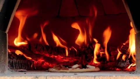Pizza on fire says help me watch it now it is crying for help