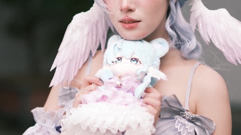 Ethereal Angelic Cosplay with Halo and Wings