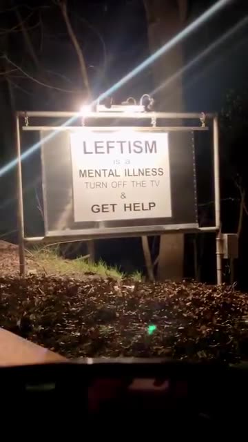 You gotta see this sign! Leftism Is a mental illness turn off the TV and get help