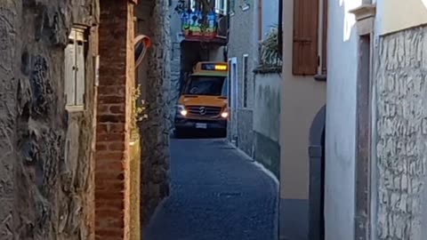 Bus Passes in a Narrow Alley