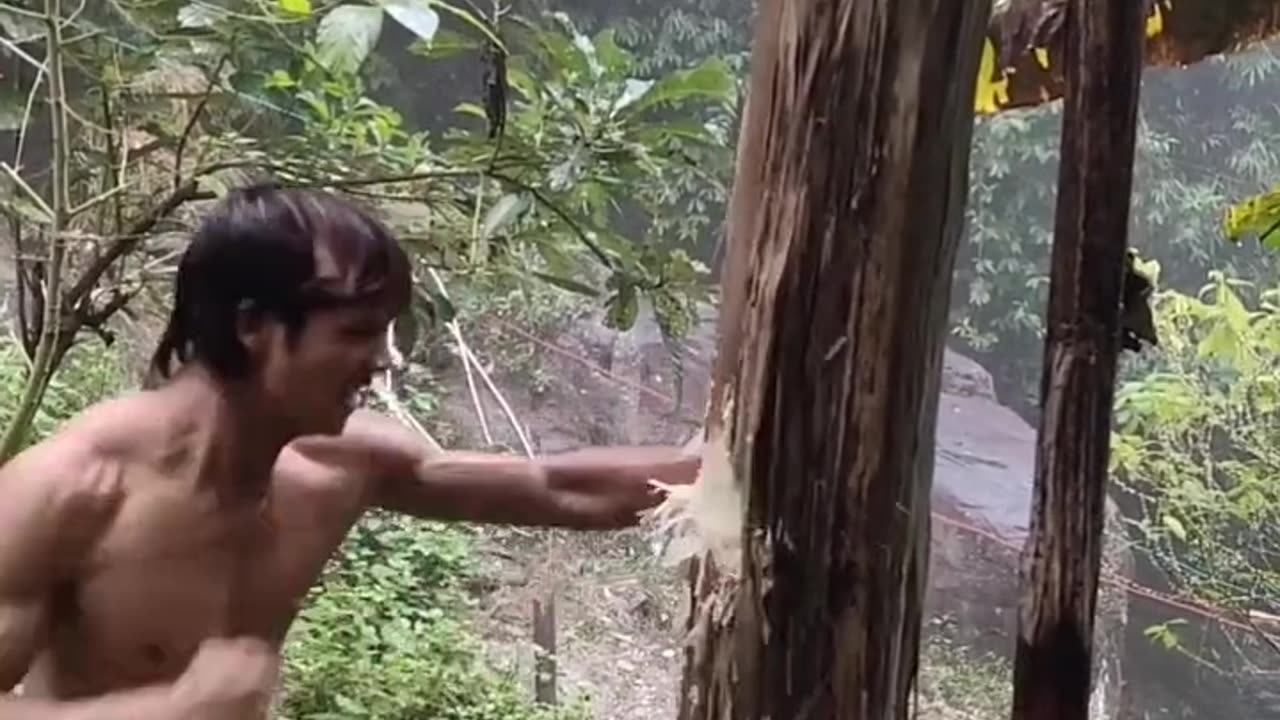 "Powerful Punches! Man Knocks Down Banana Tree with His Fists! 🌴💥"