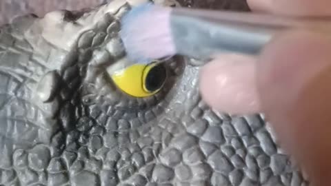 Miss dino doing her makeup routine