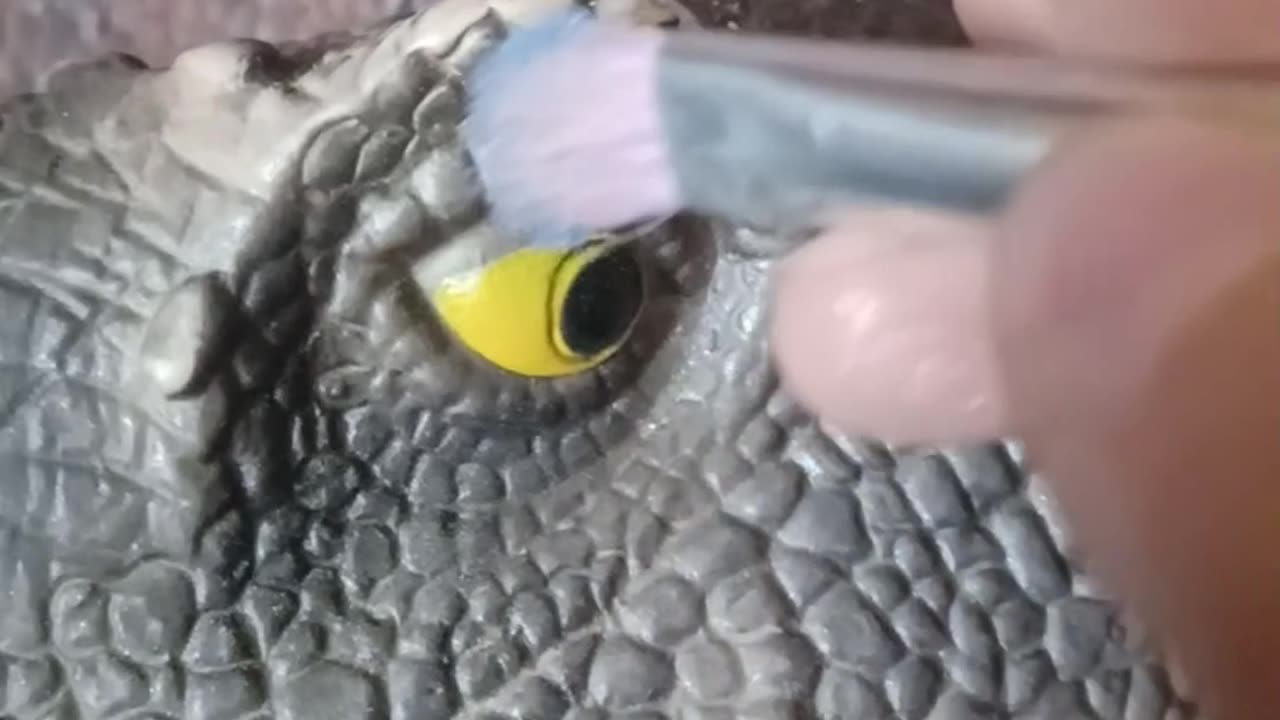 Miss dino doing her makeup routine