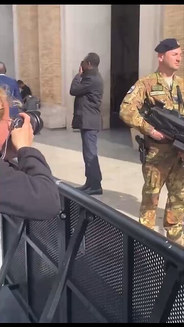Italian Soldier Seen With A Crowd Pulse Stun Gun