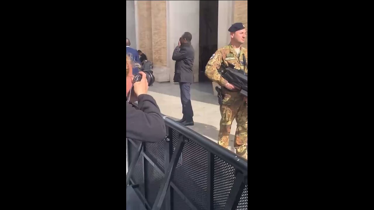 Italian Soldier Seen With A Crowd Pulse Stun Gun