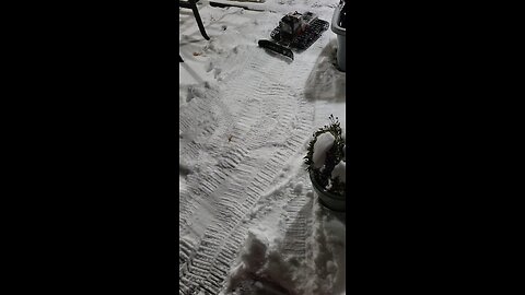 Blizzard RC plowing snow