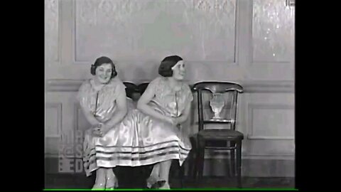 Conjoined twin Margaret Gib gets a kiss from her boyfriend while her sister Mary looks on in 1940s.