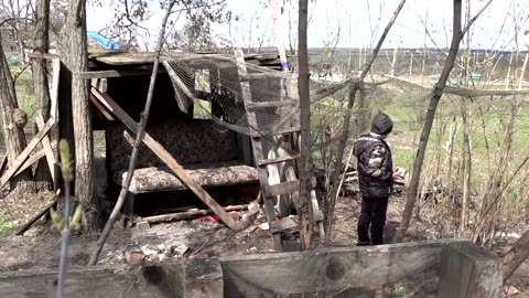 Brothers in abandoned Ukrainian village live a childhood shaped by war