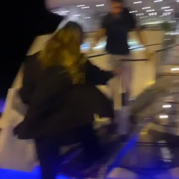 She hops on a super yacht in Greece like it’s nothing while a storm’s rolling in lol