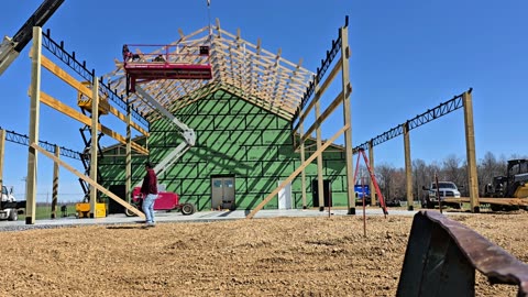 36' Parallel Trusses with a 6/12 pitch going up on the building