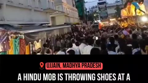 A Hindu mob is throwing shoes at a mosque during a procession of the Jagannath Rath Yatra