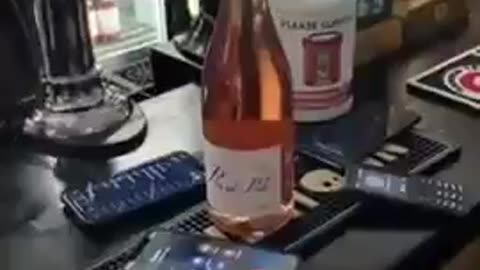 5G Cellphones Pop Champagne Bottle Open—Imagine That's Your Head