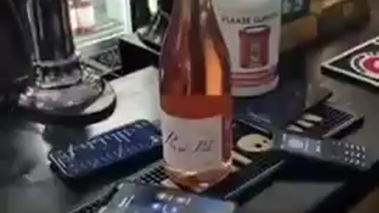 5G Cellphones Pop Champagne Bottle Open—Imagine That's Your Head