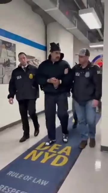 Maduro being escorted in the USA by DEA agents