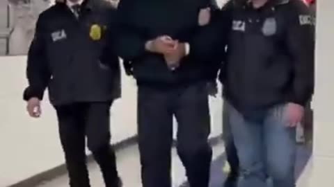 Maduro being escorted in the USA by DEA agents