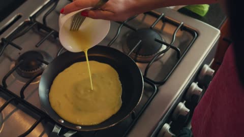 Serving eggs in a pan for breakfast