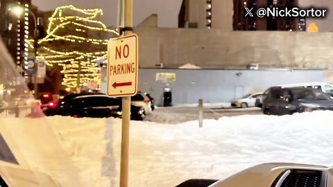 Somalis Trying To Fix Their “Learing” Sign Under The Cover Of Night