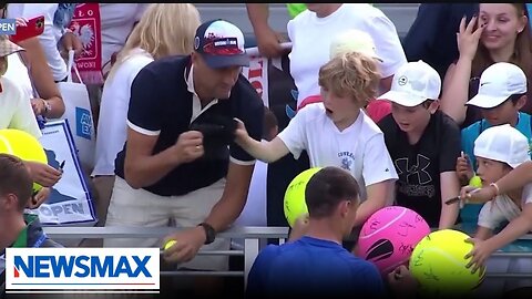 Man takes hat from kid at US Open |