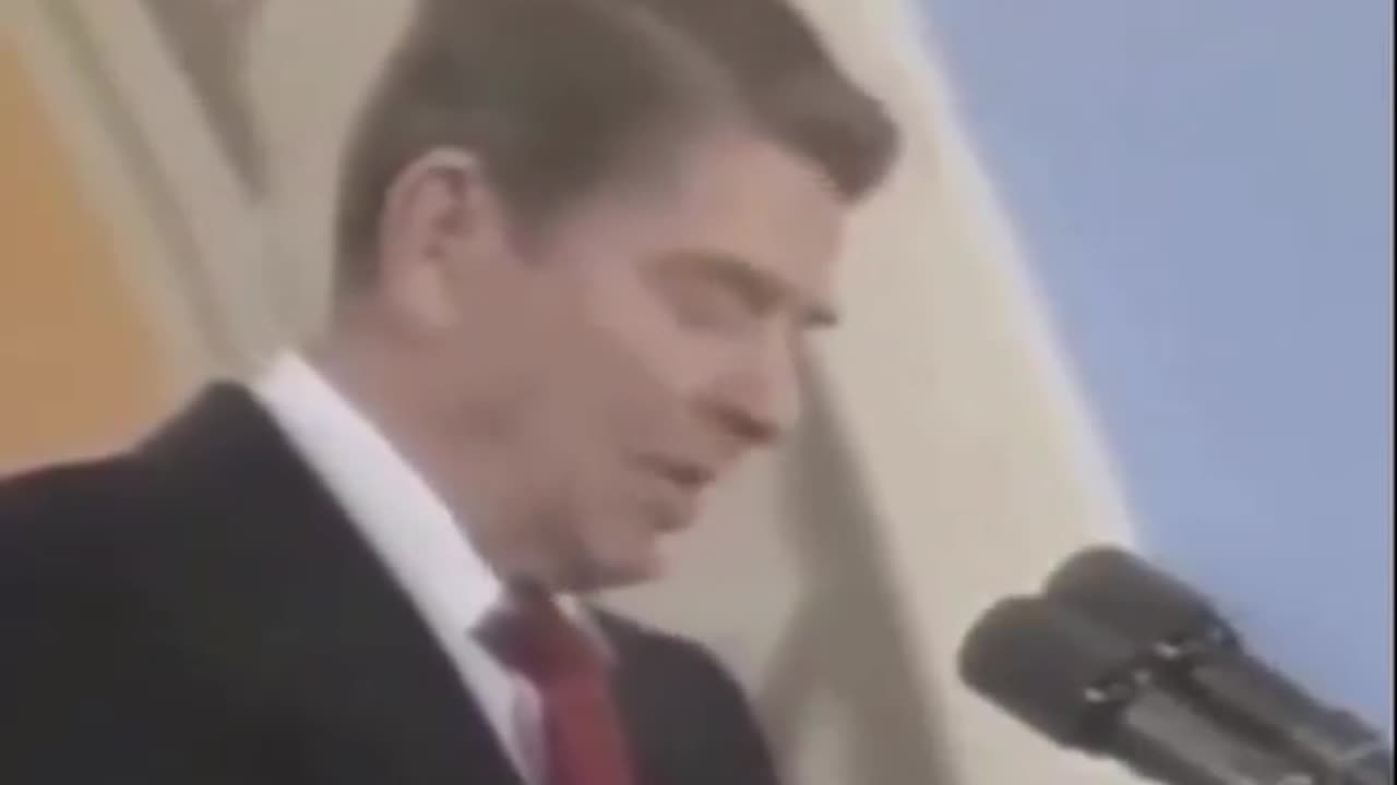 Ronald Reagan reacting to the popping of a balloon during a speech in 1987