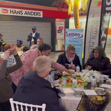 Why do Dutch police officers in uniform participate in Ramadan?