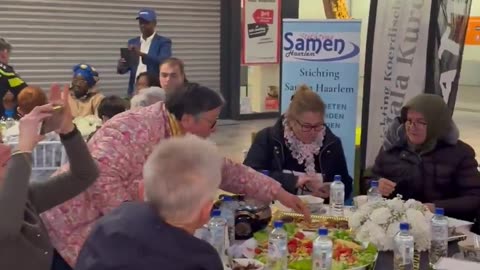 Why do Dutch police officers in uniform participate in Ramadan?