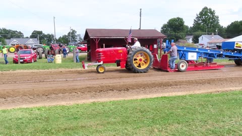 a great red Tractor during the tractor pull in Marshallville, Ohio