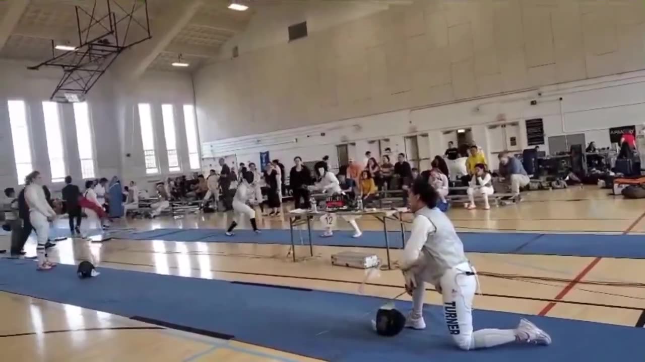 🤺🚨Historic Protest: Female Fencer Takes a Knee in Bout Against Male Opponent, Faces Immediate Disq