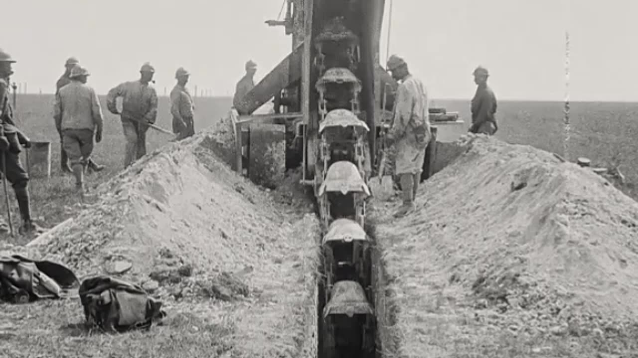 French troops using a mechanical trench-digger at Saint-Étienne-au-Temple during WWI