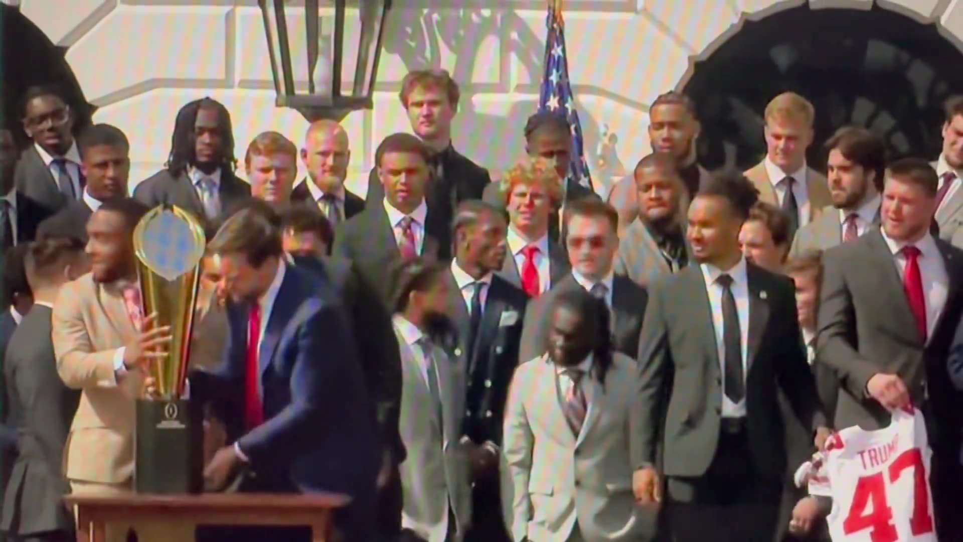 The CFP National Championship Trophy falls apart as VP JD Vance tries to hold it at the White House