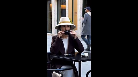 You can stare at an elegant girl drinking Caffè for a long time