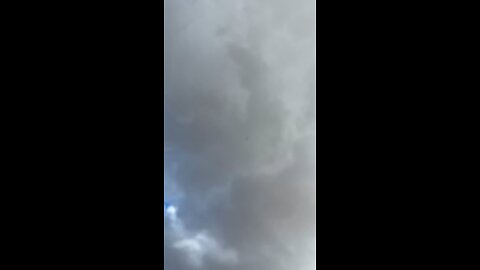 Video showing a spherical UAP flying through the sky, changing directions