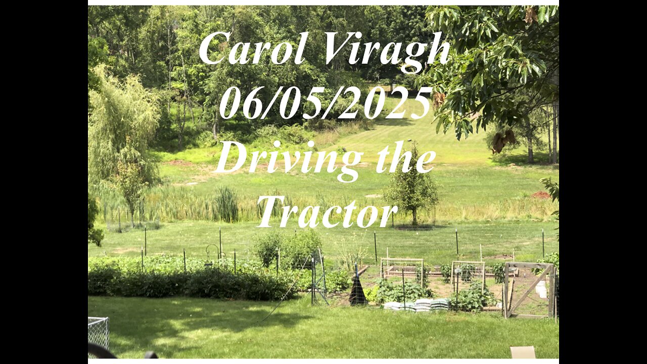 Carol riding the Tractor June 2025