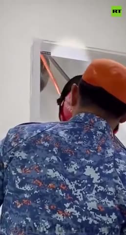 150 lb. Python crashes through a Malaysian family's ceiling