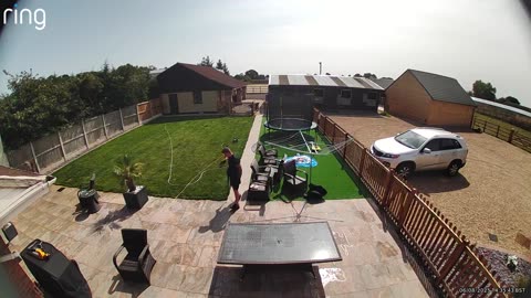Sudden Surge of Wind Topples Man With Trampoline