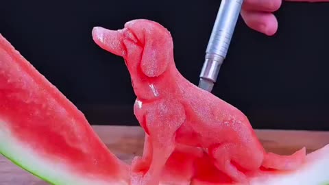 Wang Xifa is a Chinese that makes fruit-carving look easy