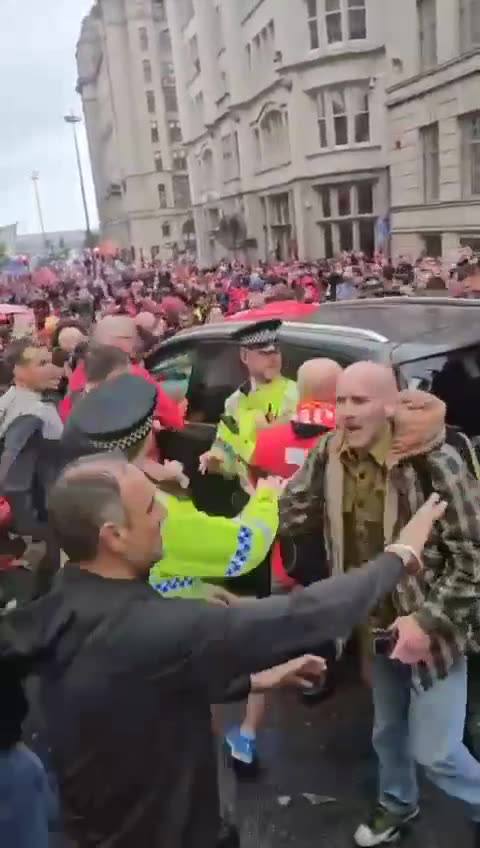 Liverpool Supporters attack driver who mowed down pedestrians