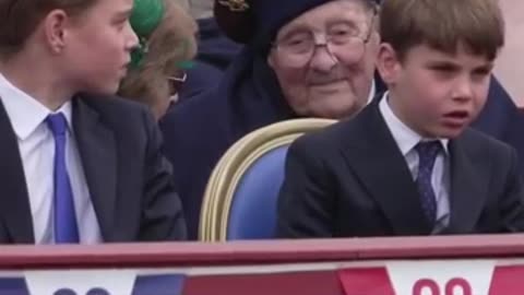 Prince Louis imitates Prince George doing his hair