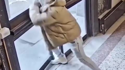 A 33-year-old man faces a felony after smashing through a locked emergency exit