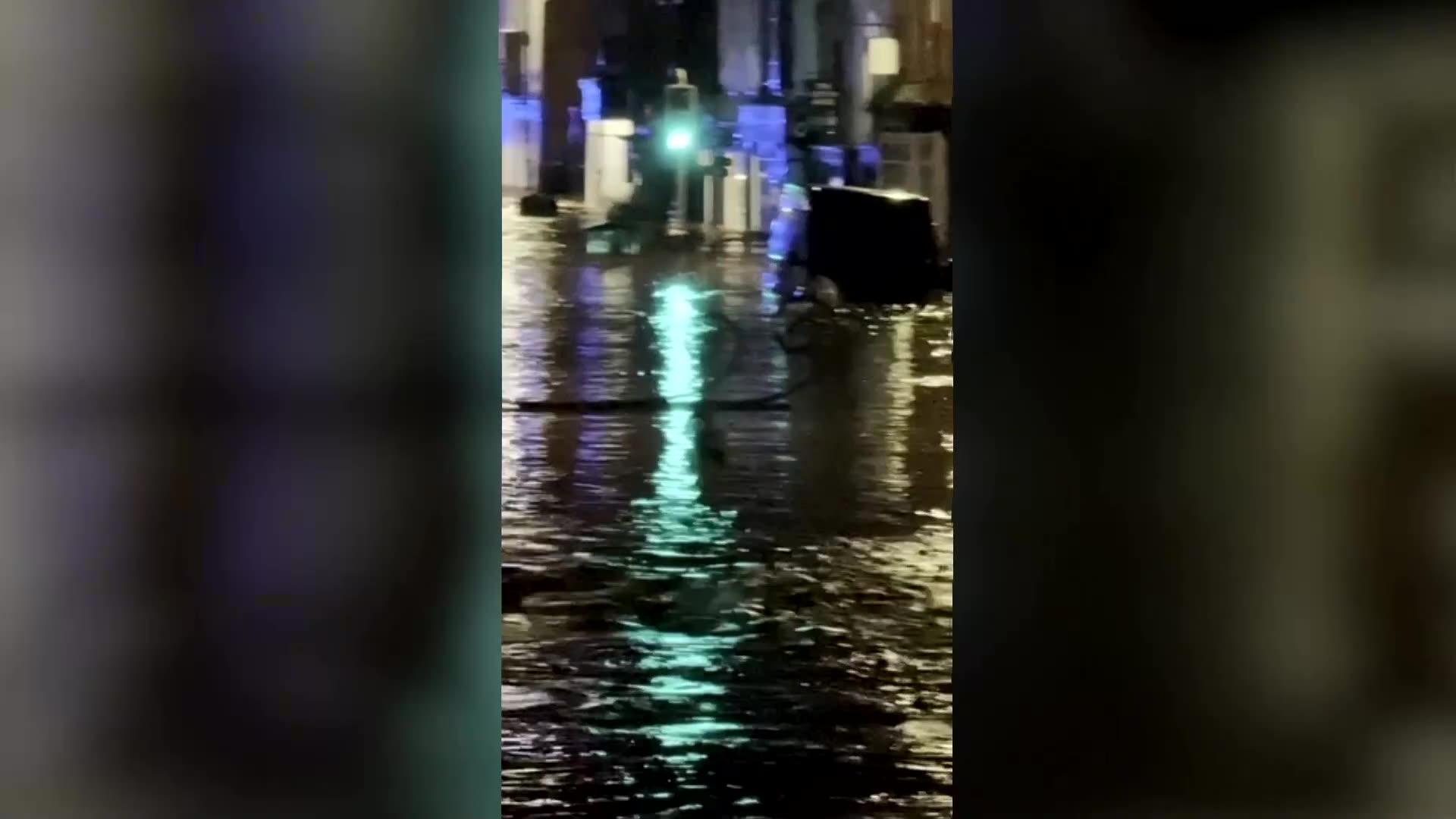 Floodwaters gush through town in Wales after Storm Claudia hits