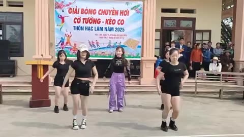 folk dance to celebrate the volleyball, tug of war, and chess tournament in the homeland