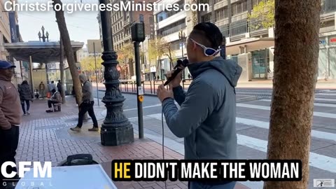 A transgender pulls a gun on a street preacher in San Francisco.