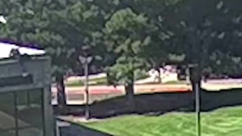 CCTV video shows suspect climbing down off roof after Charlie Kirk shooting