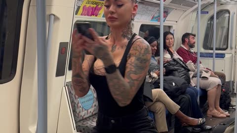 Girl Hanging by Her Hair in the Subway