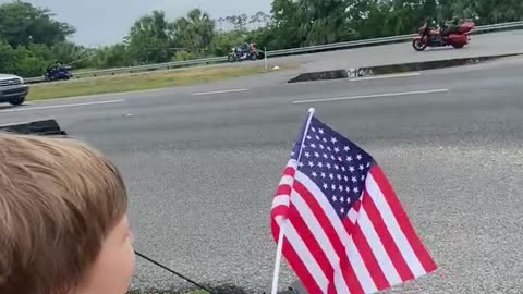 Young Patriot & Loyal Dog Wave Flag in Epic Vietnam Memorial Wall Motorcycle Escort | Space Coast