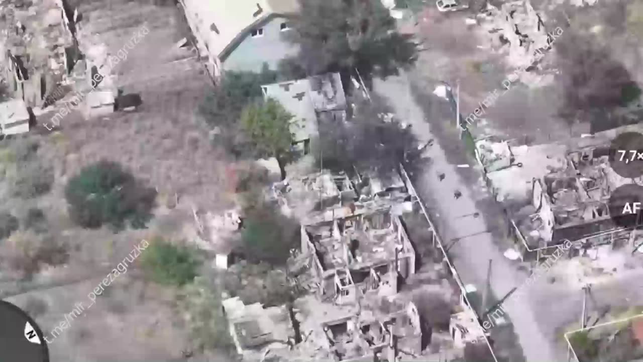 Russian Servicemen Move Through the Ruins of Pokrovsk