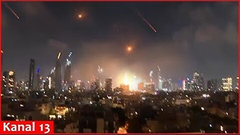 Video shows massive wave of missiles coming from Iran and explosions in Tel Aviv