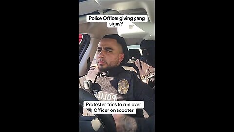Police Officer giving gang signs??