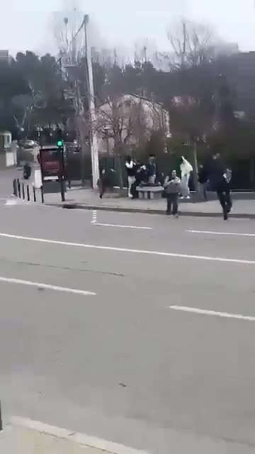 The usual suspect with a machete chases students outside a school in France.