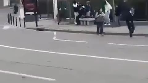The usual suspect with a machete chases students outside a school in France.